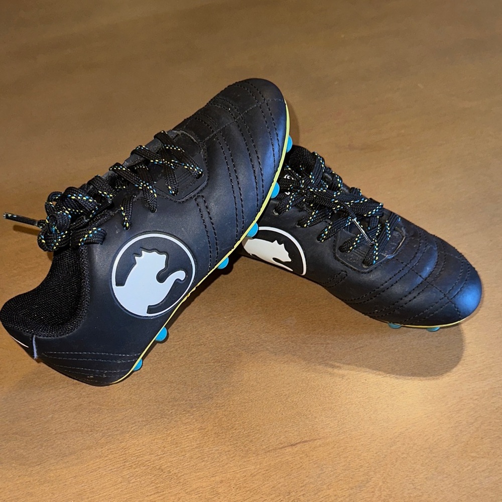 Puma Boys Black Soccer Cleats with Blue Studs